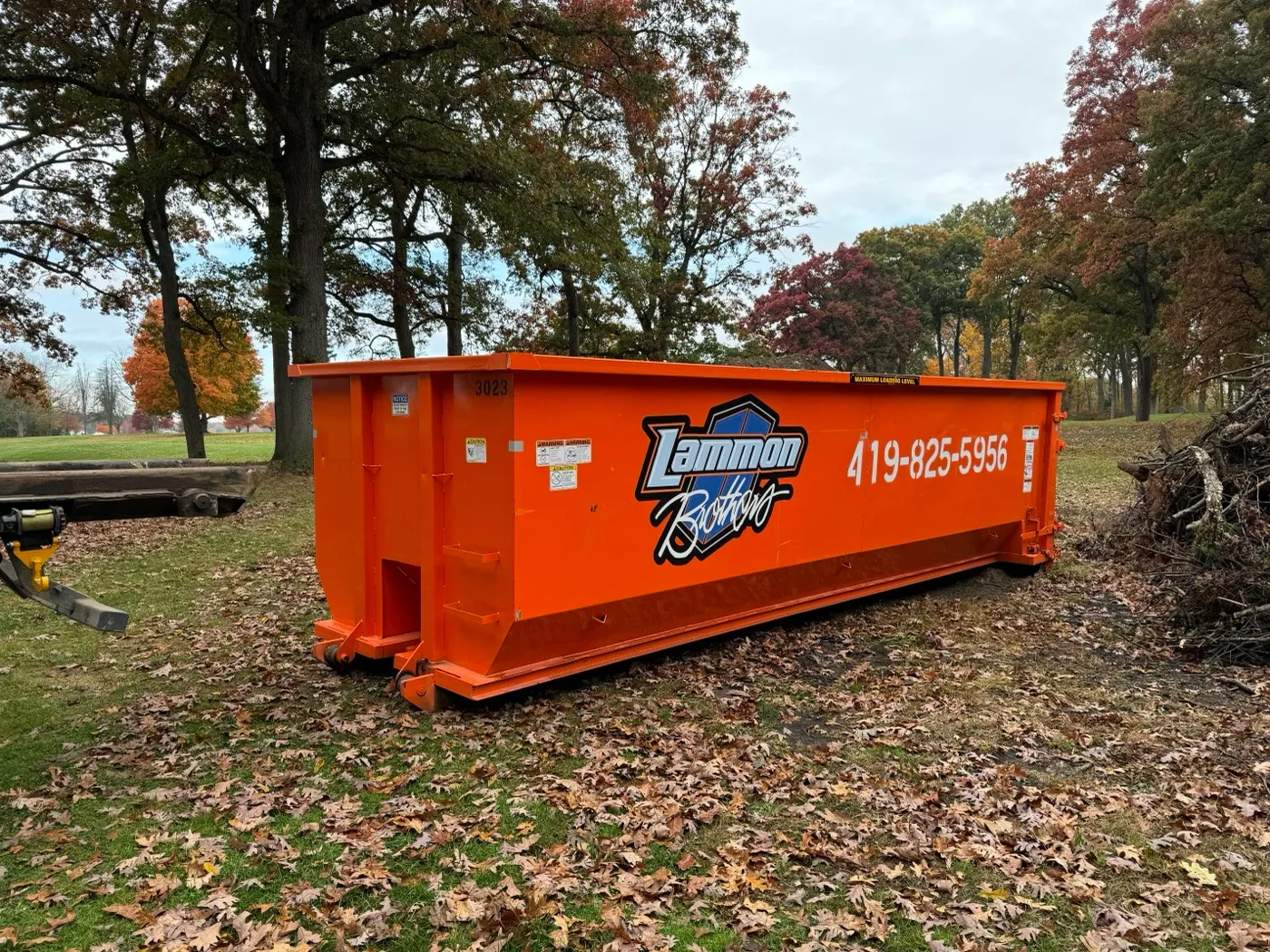 A Lammon Brothers roll-off dumpster on a job in Lemoyne, Wood County, OH.
